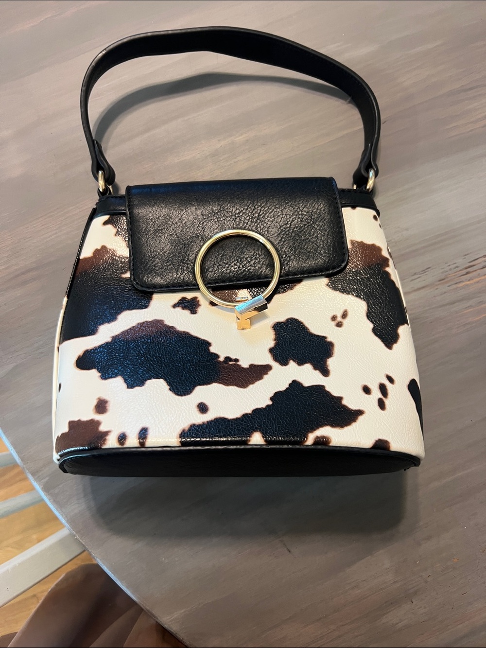 Selling for a friend: Black & Cream Cowhide-Print Top Handle Bag
